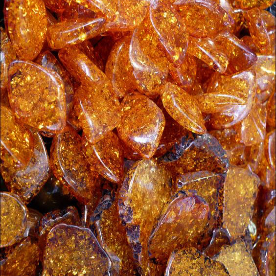 close up of the base note ingredient, amber which is used in the scented candle AMOR candle