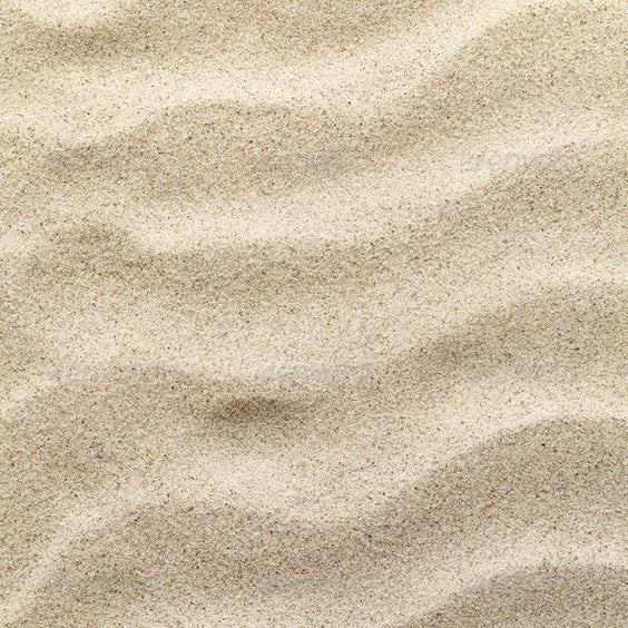 close up of the BASE notes ingredient, SAND which is used in the scented candle BEACH