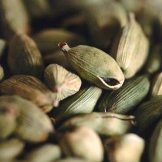 close up of the TOP notes ingredient, CARDAMON which is used in the scented candle OUD