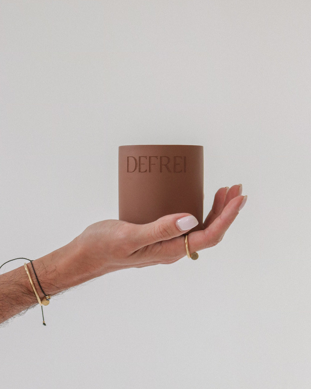 Someone holding the VANILLE, scented hand poured luxury candle