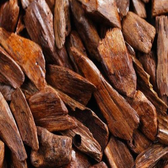 close up of the base note ingredient, sandalwood which is used in the scented candle VANILLE CANDLE